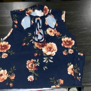 J for Justify. Short sleeved floral shirt. Size Medium.